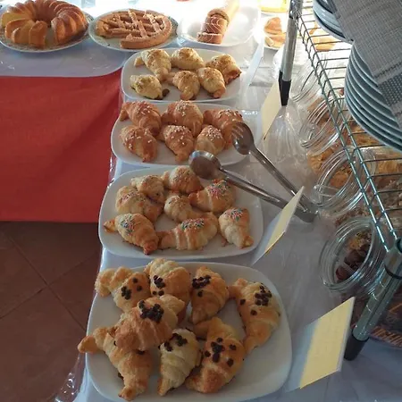 Batarà - La Terrazza Del Centro Couette-café 3*